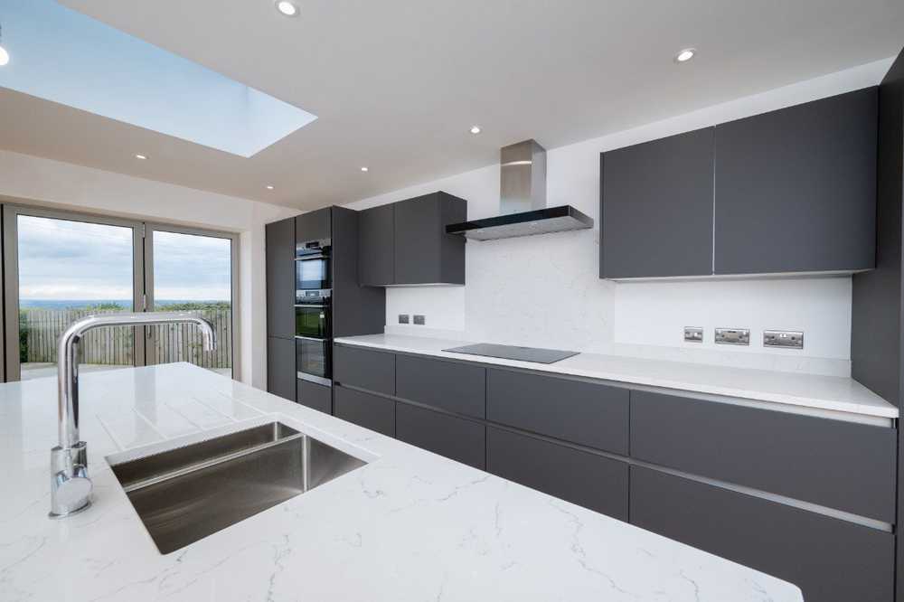 Young Modern Graphite Soft Close Kitchen with Large Matching Island –White Quartz 30mm Worktops