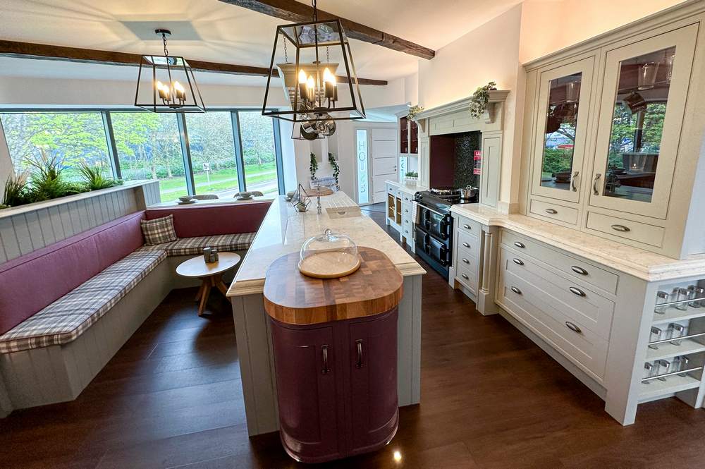 Ex Display Mereway Traditional Inframe Painted Pale Grey Kitchen & Castle Grey Island with Integrated Bench Seating Area plus Overhead Pan Rack – Neff Dishwasher – Tahiti White Imperial Quartz Worktops Walnut Butchers Block