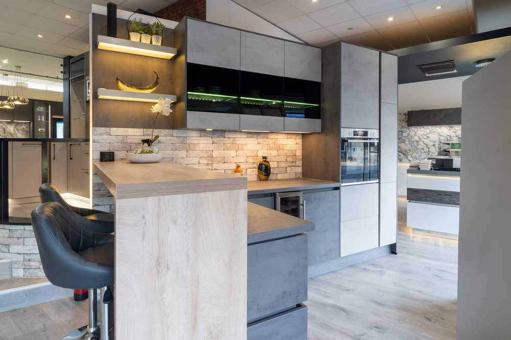 Ex Display Nobilia Riva Concrete Slate & Grey Kitchen with Peninsula & Breakfast Bar – Bosch Baumatic Appliances - Concrete Slate Grey Laminate Worktops - 3832885